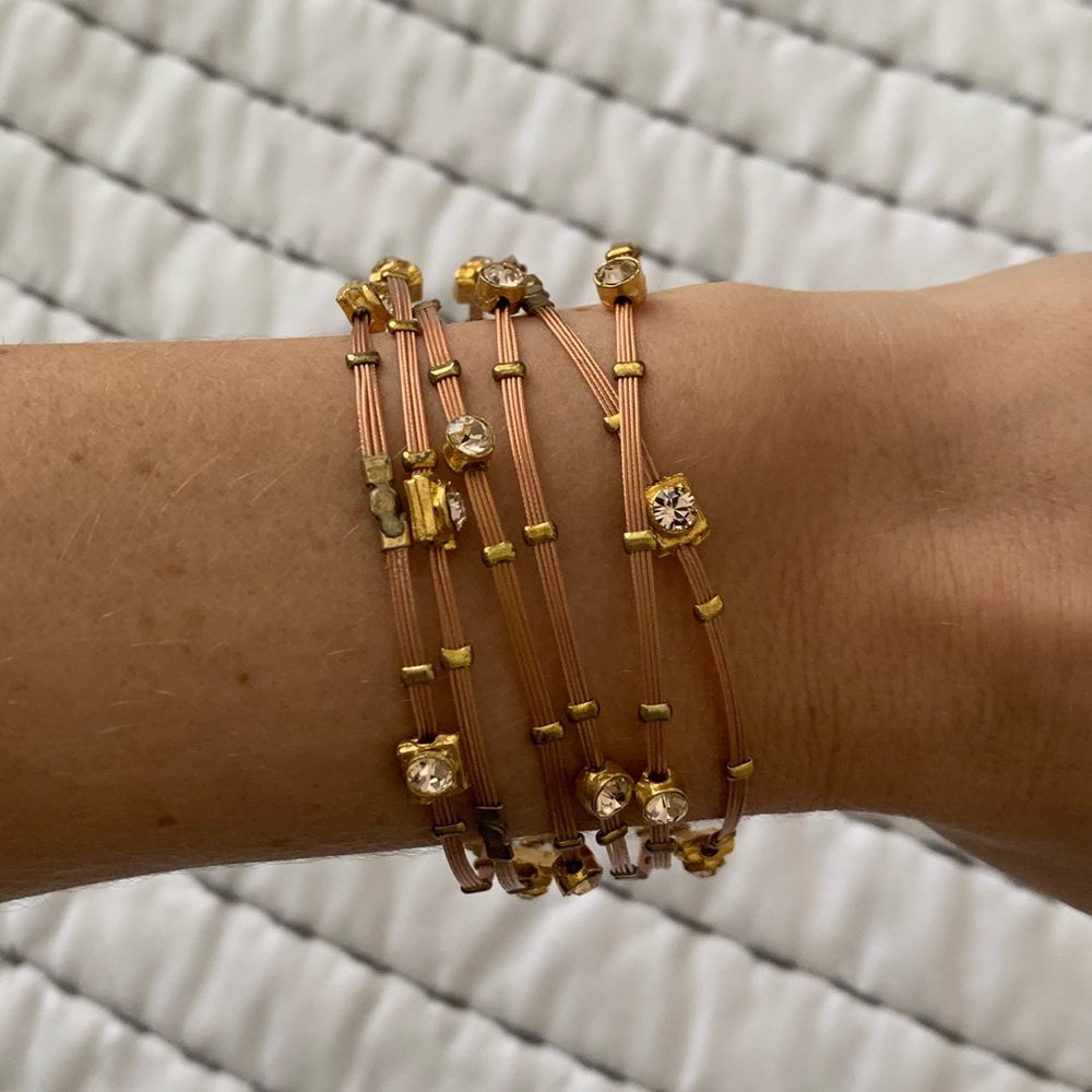 Set of 6 tan and gold bracelets